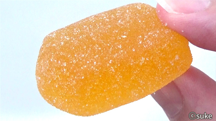 ノーベル やわらか果実ゼリー表面の粒の細かい白砂糖の画像