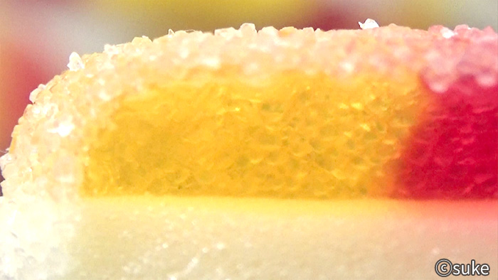 Trolli ファニバース スイートミックスグミ マシュマロ付きハート パッションフルーツ味の山吹色拡大画像